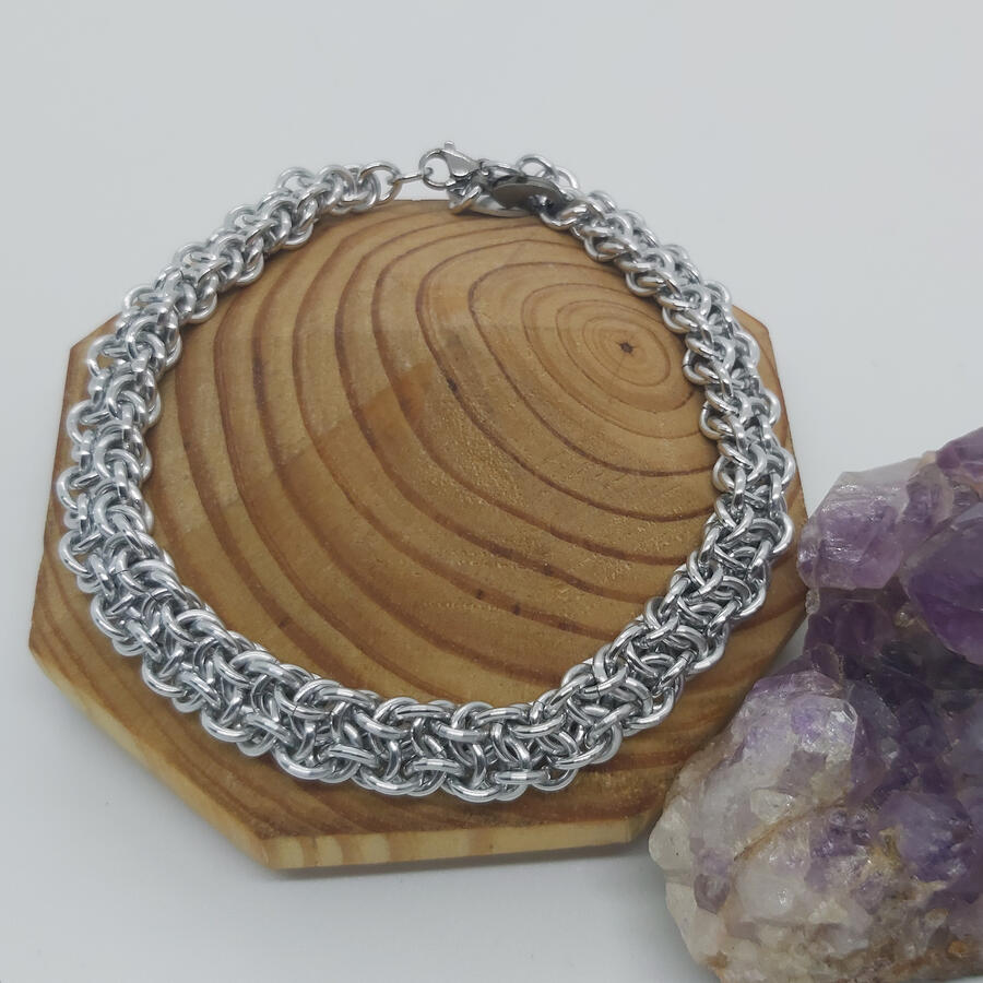 Vipera Berus Weave bracelet, made with anodized aluminum rings