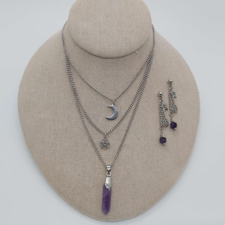 Witch's Pendant and Earring set, made to give the illusion of wearing 3 separate chains. Stainless steel and Amethyst.
