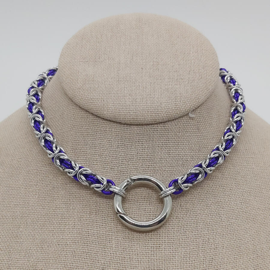 Day Collar, made with anodized aluminum rings (unable to recall metal of closure).