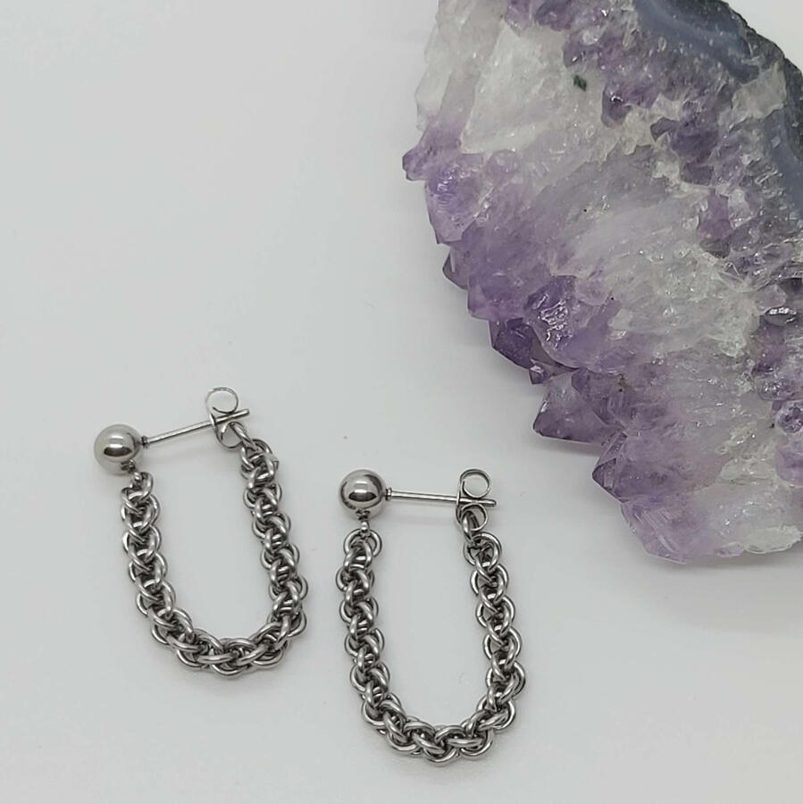 JPL3 Earrings. These earrings are made with stainless steel rings. The butterfly backing is connected to the chain which helps to create the design.